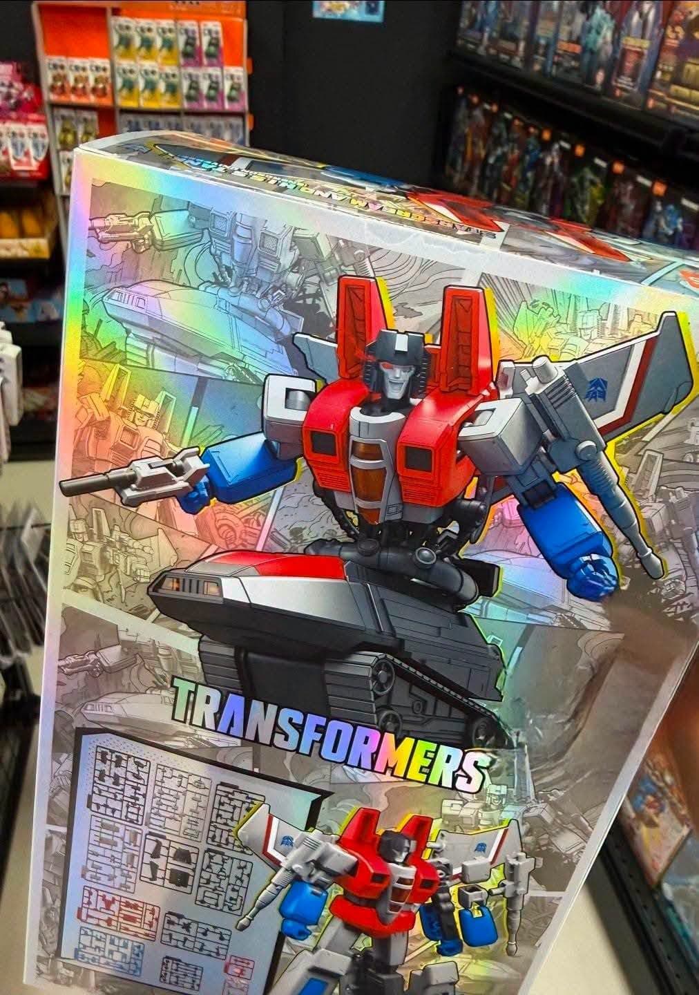 Sisi hologram box Blokees Starscream CC-28 DX dengan ilustrasi komik